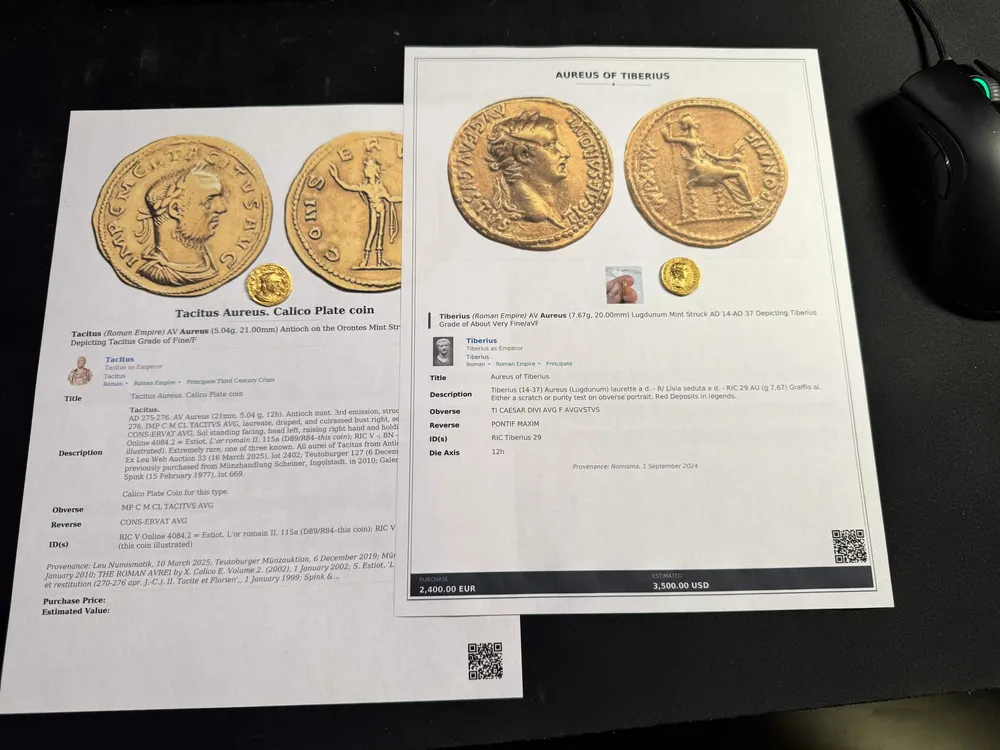 Two printed NumisVault coin folios showing Roman gold aurei with full attribution and pricing details