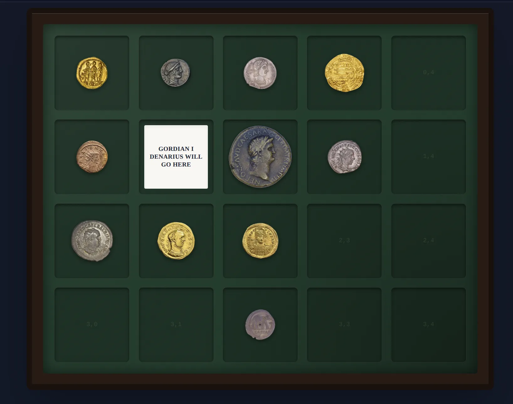 A Numisvault coin tray showing coins arranged in a customized grid with colored felt background